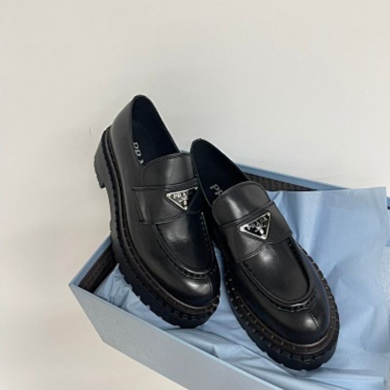 Prada Chocolate Brushed Leather Loafers in full black ("Nero").