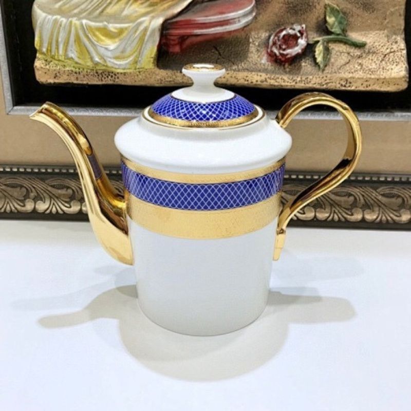 Dior royal blue and gold tea set.