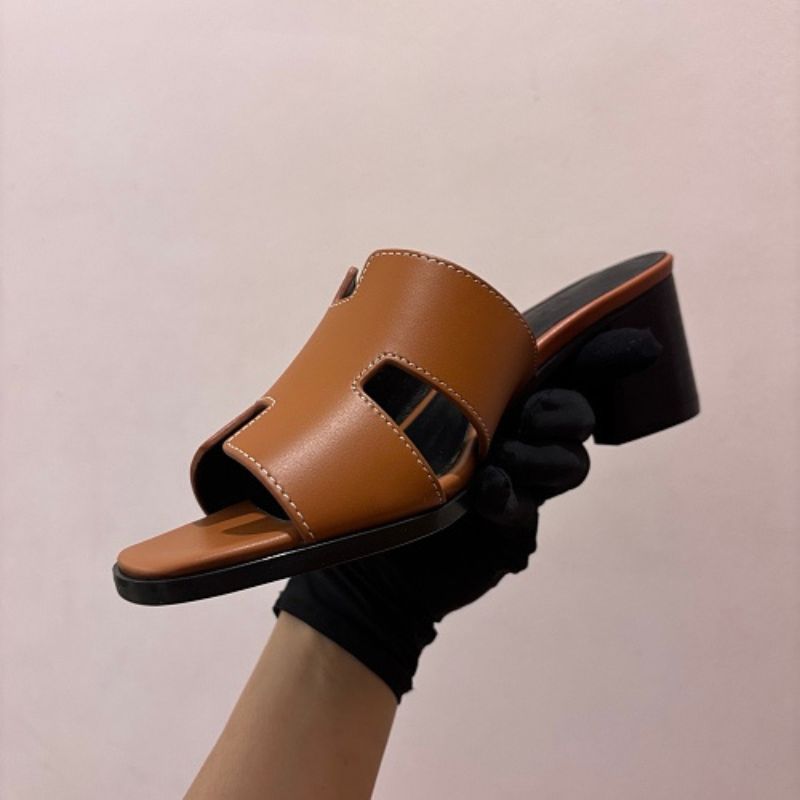 Hermès Oasis Sandals, the elegant heeled counterpart to the iconic Oran flat.
