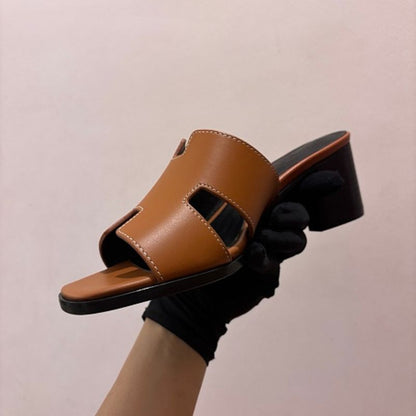 Hermès Oasis Sandals, the elegant heeled counterpart to the iconic Oran flat.