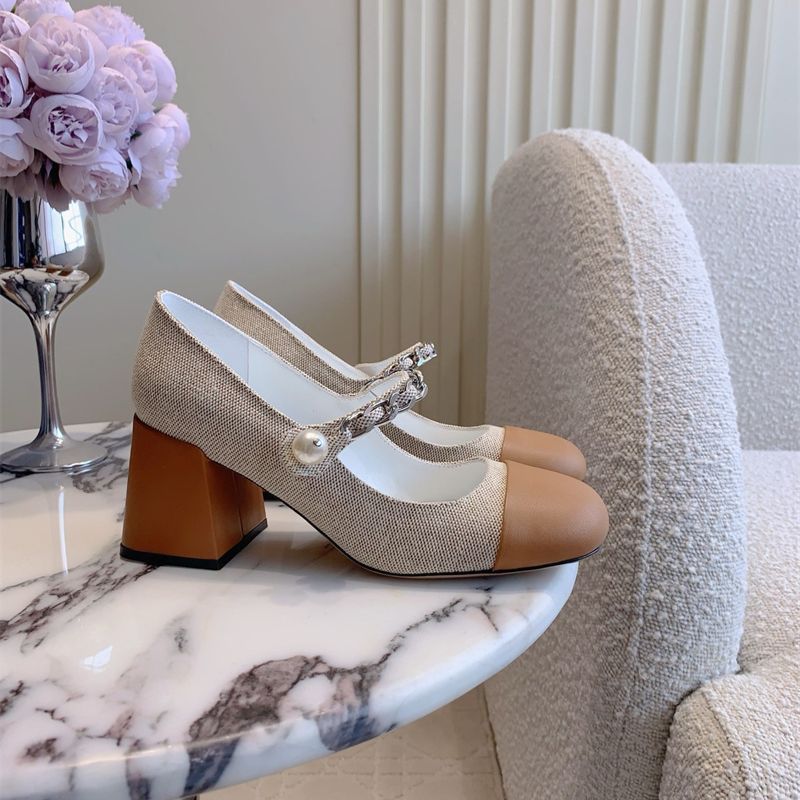 Miu Miu Mary Jane flats.