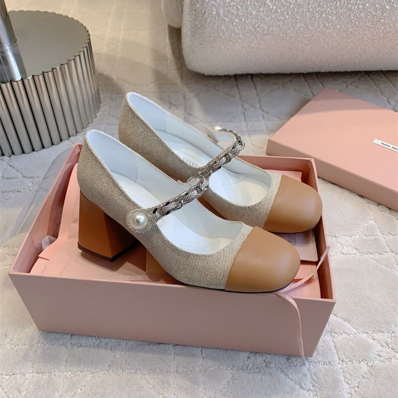 Miu Miu Mary Jane flats.