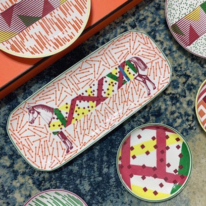 Hippomobile tableware collection by Hermès,