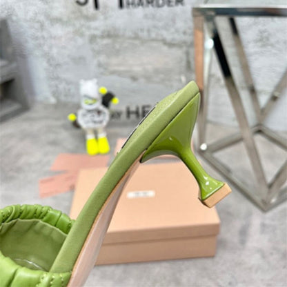 Miu Miu "Matelassé" leather slides in a green