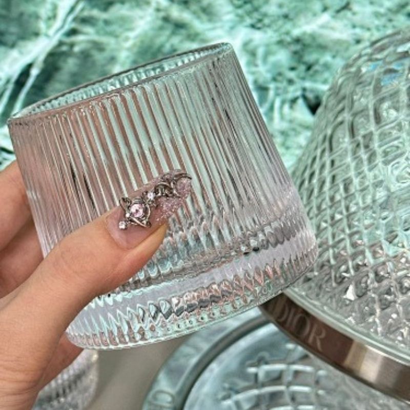 Dior rotating whiskey glass set,