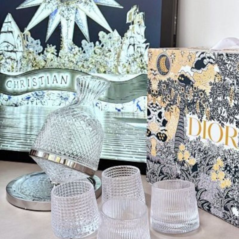 Dior rotating whiskey glass set,