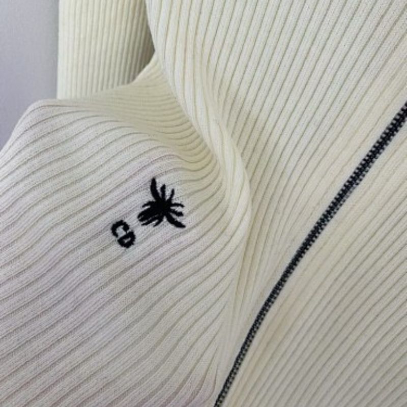 Christian Dior white knitted zip-up cardigan.