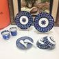 Hermès the Bleus d'Ailleurs porcelain dinnerware collection.