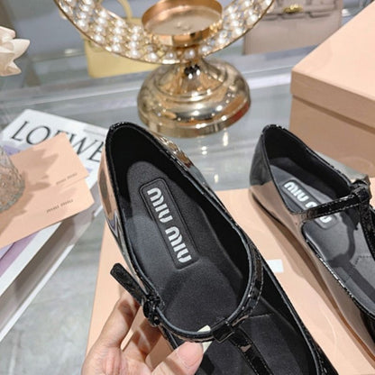 Miu Miu Logo-Lettering Patent Ballerina Flats in black.