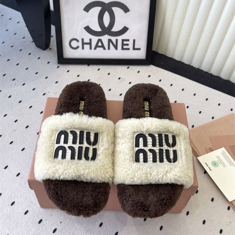 Miu Miu Logo Shearling Slides.