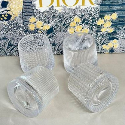 Dior rotating whiskey glass set,