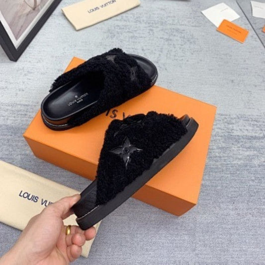 Louis Vuitton Paseo Flat Comfort Mules.