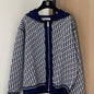 Christian Dior reversible zipped cardigan with a hood.