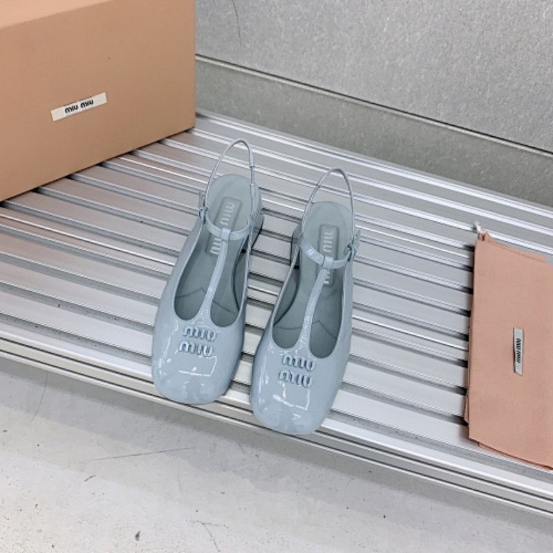 Miu Miu patent leather T-bar Mary Jane flats.