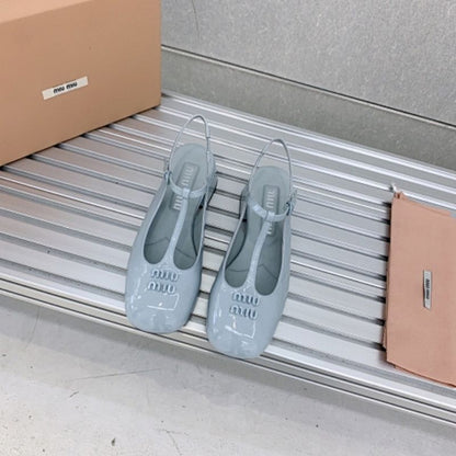 Miu Miu patent leather T-bar Mary Jane flats.