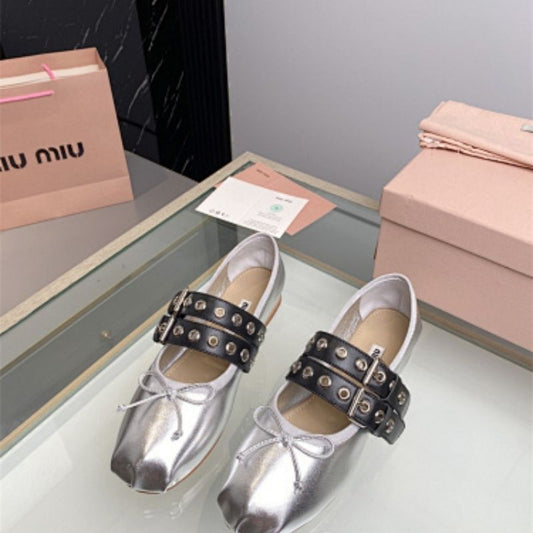 Miu Miu Studded Leather Ballerina Shoes.