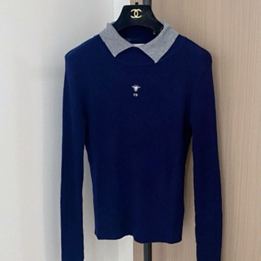 Christian Dior long-sleeved top with a grey collar and the signature Dior bee embroidery.