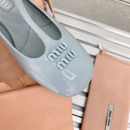 Miu Miu patent leather T-bar Mary Jane flats.