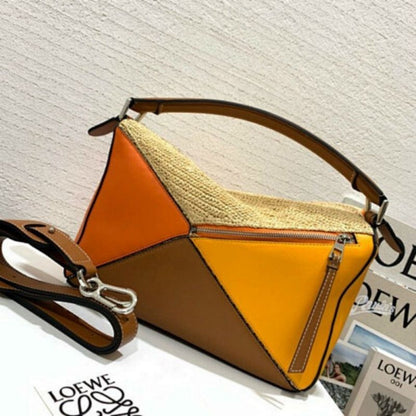 Loewe Puzzle Bag  natural raffia with color-blocked leather panels.