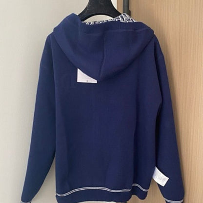 Christian Dior reversible zipped cardigan with a hood.