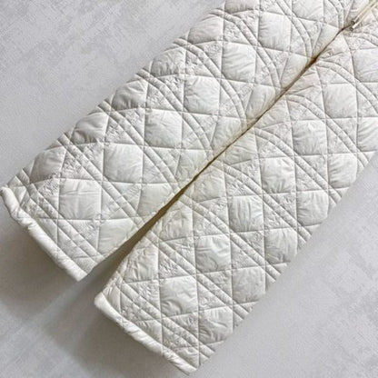 Christian Dior wide-leg pants with the signature Cannage motif.