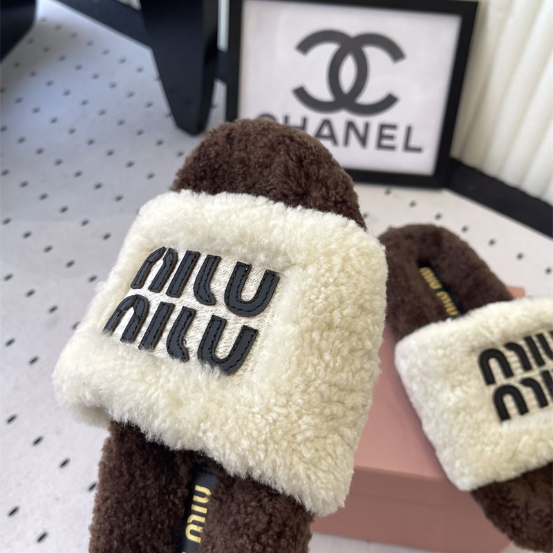 Miu Miu Logo Shearling Slides.