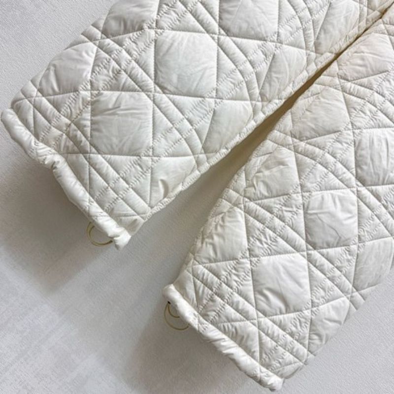 Christian Dior wide-leg pants with the signature Cannage motif.