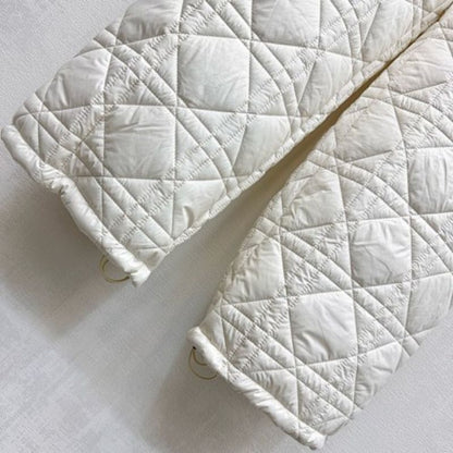 Christian Dior wide-leg pants with the signature Cannage motif.