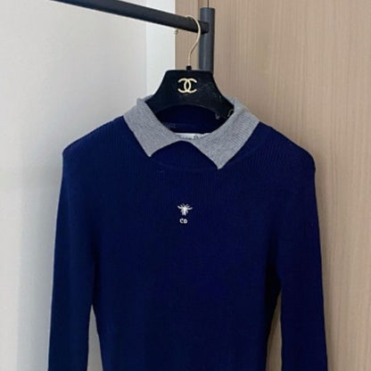 Christian Dior long-sleeved top with a grey collar and the signature Dior bee embroidery.