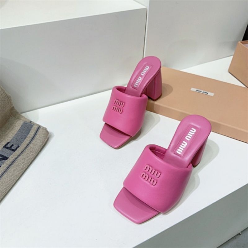 Miu Miu Logo-Embossed Block Heel Mules in pink