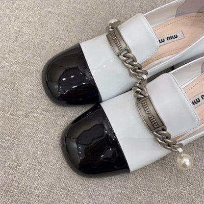 Miu Miu two-tone patent-leather loafer pumps black and white color-blocked design