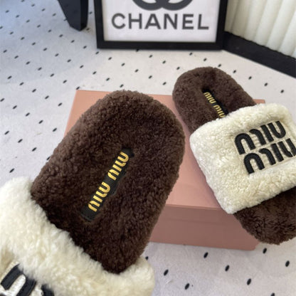 Miu Miu Logo Shearling Slides.