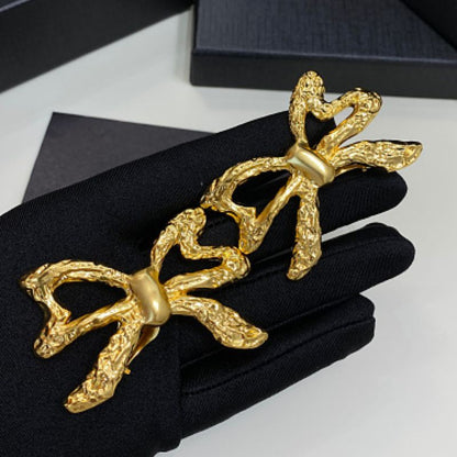 Saint Laurent Textured Bow Clip-On Earrings