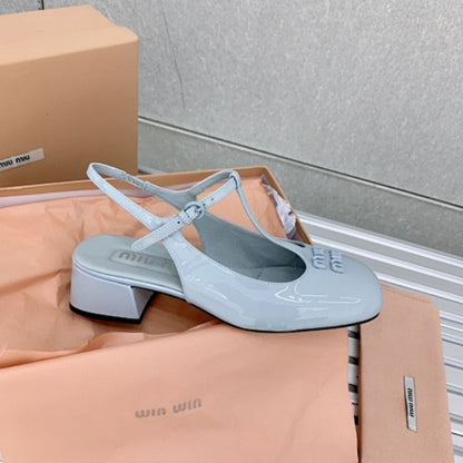 Miu Miu patent leather T-bar Mary Jane flats.