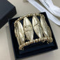authentic Chanel textured wheat leaf cage cuff bracelet,