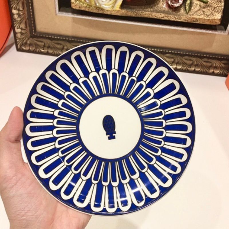 Hermès the Bleus d'Ailleurs porcelain dinnerware collection.