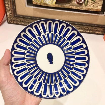 Hermès the Bleus d'Ailleurs porcelain dinnerware collection.