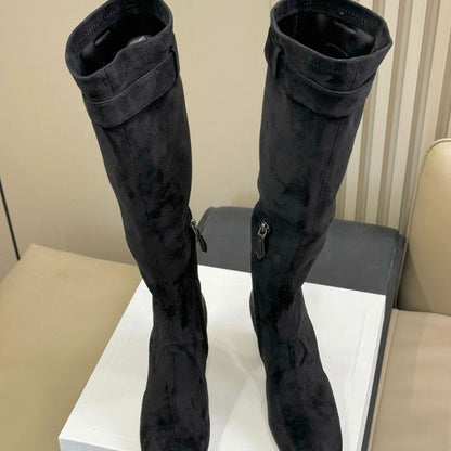 black suede knee-high boots.