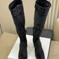 black suede knee-high boots.