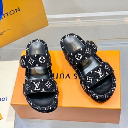 Louis Vuitton Jumbo black and white Monogram velvet Flatform Mules.
