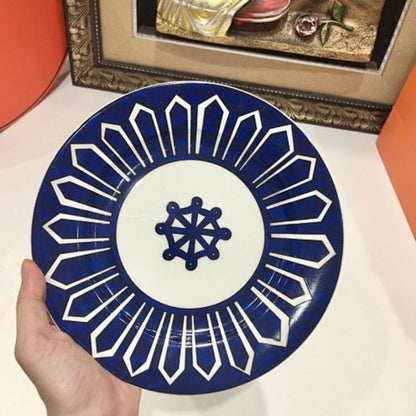 Hermès the Bleus d'Ailleurs porcelain dinnerware collection.