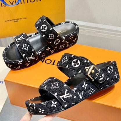 Louis Vuitton Jumbo black and white Monogram velvet Flatform Mules.