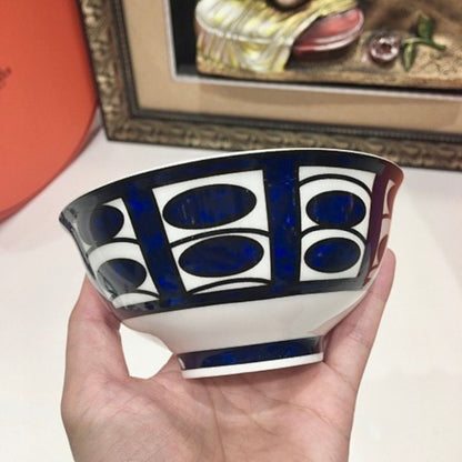 Hermès the Bleus d'Ailleurs porcelain dinnerware collection.