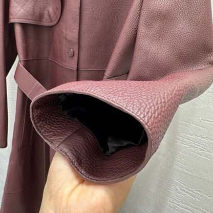 Hermès leather trench coat in a deep burgundy