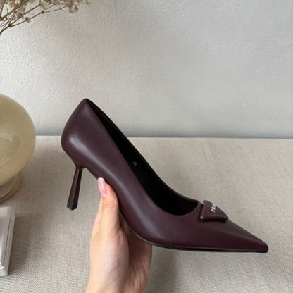 Prada 75mm Padded Triangle-Logo Leather Pumps.
