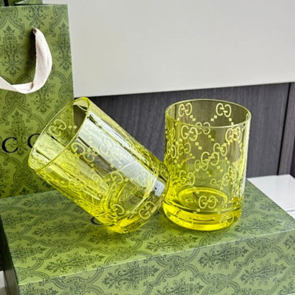 Gucci yellow-tinted crystal tumblers,