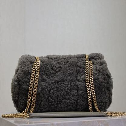 Saint Laurent Jamie Puffer Flap Bag in shearling.