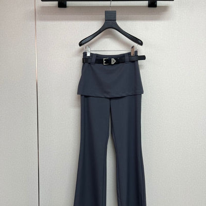 Prada layered trousers with a wrap-around skirt overlay.