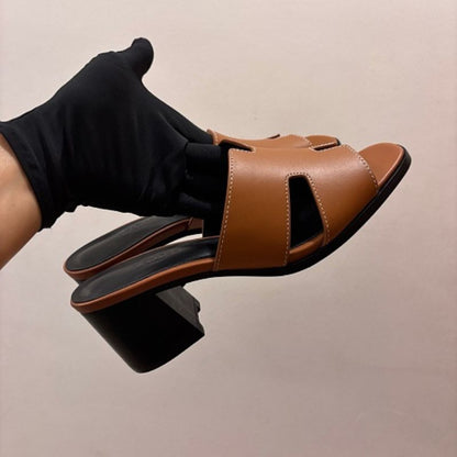 Hermès Oasis Sandals, the elegant heeled counterpart to the iconic Oran flat.