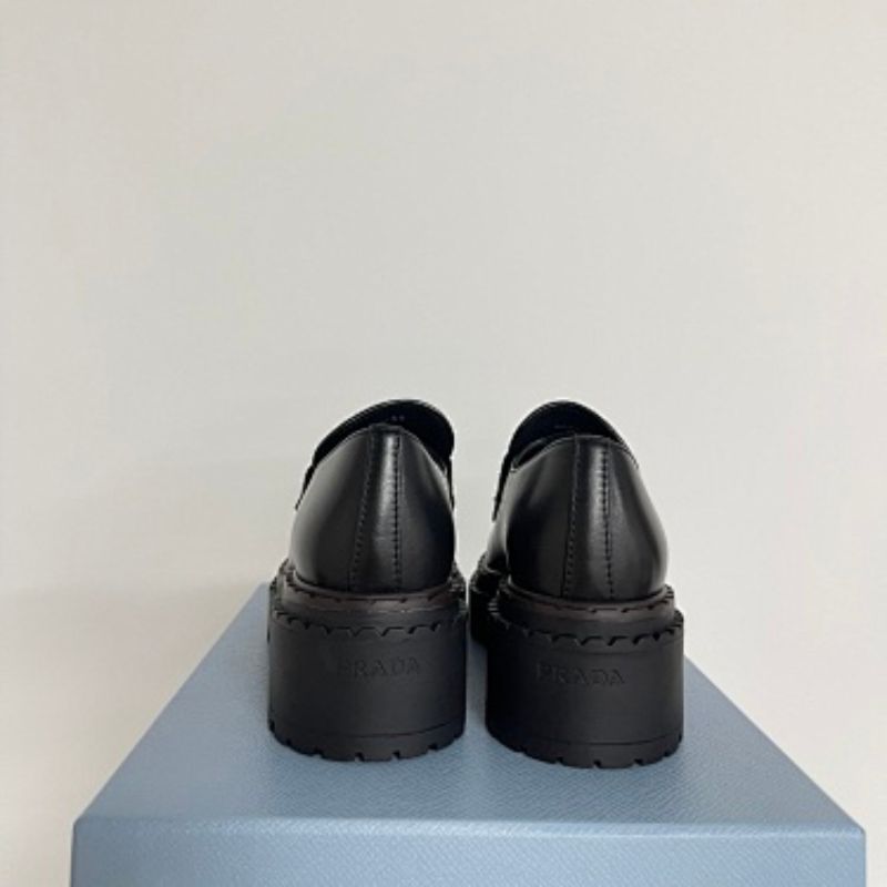 Prada Chocolate Brushed Leather Loafers in full black ("Nero").